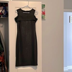 Black with sparkle fitted dress. Sleeveless.